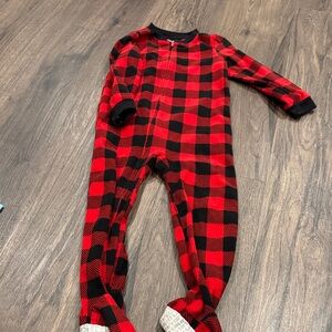 Multiple pairs and onesies of boys pajamas